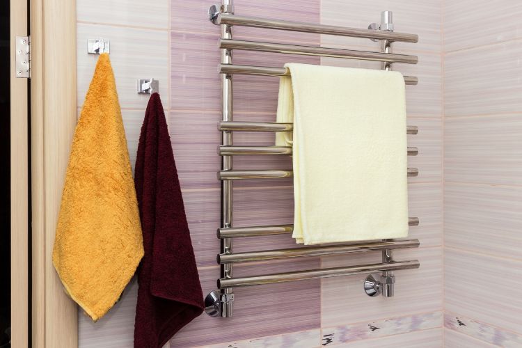 how do electric towel rails work