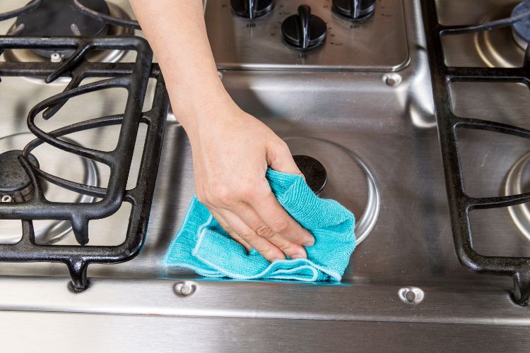 how to clean stainless steel gas range